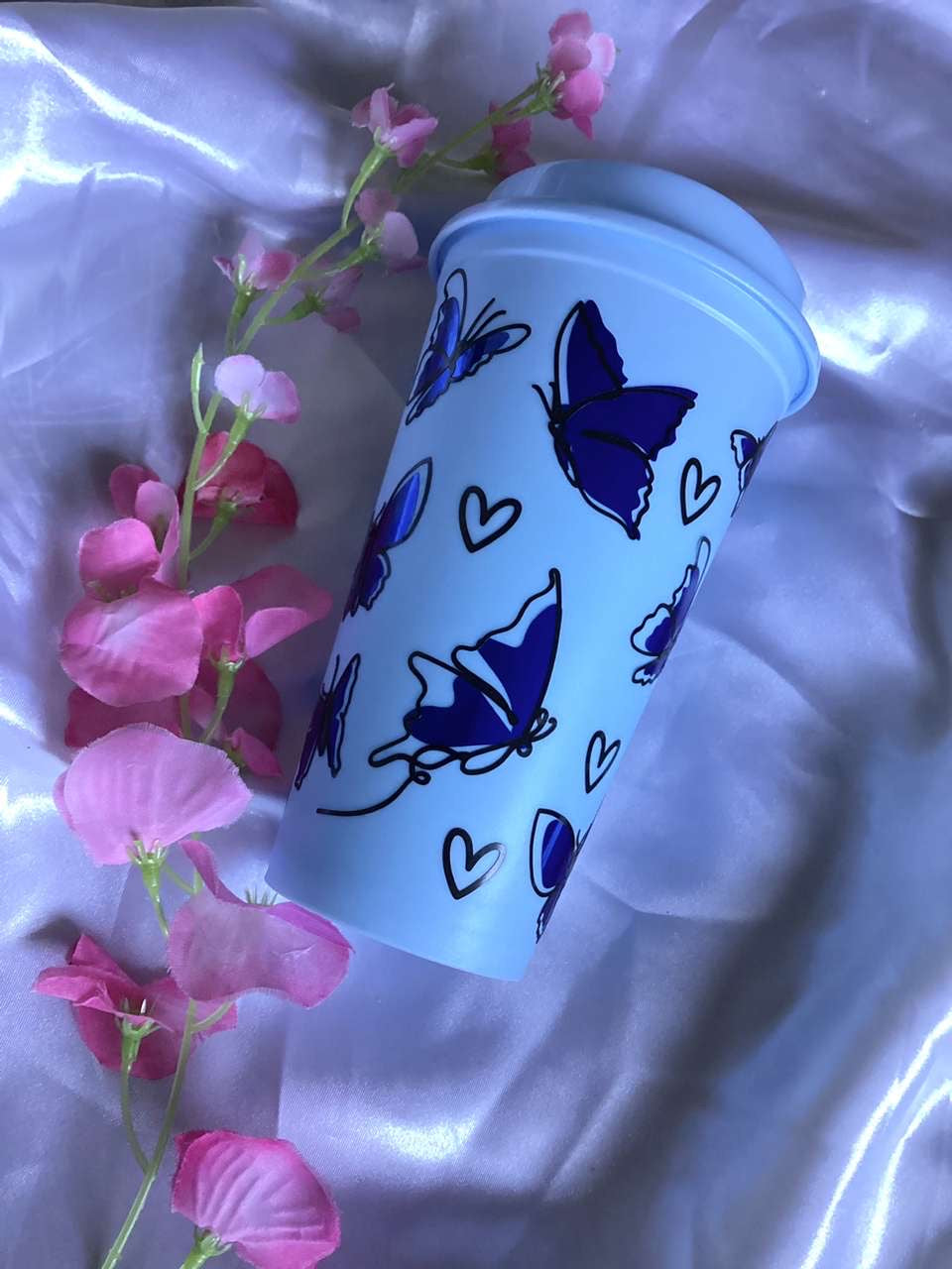 Shiny blue butterfly and heart hot cup