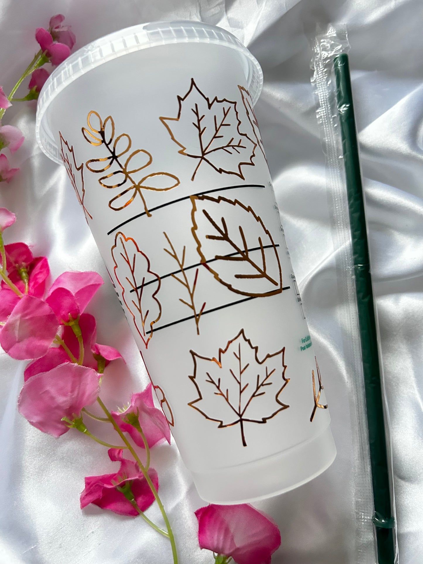 Shiny gold autumn leaf logo cold cup