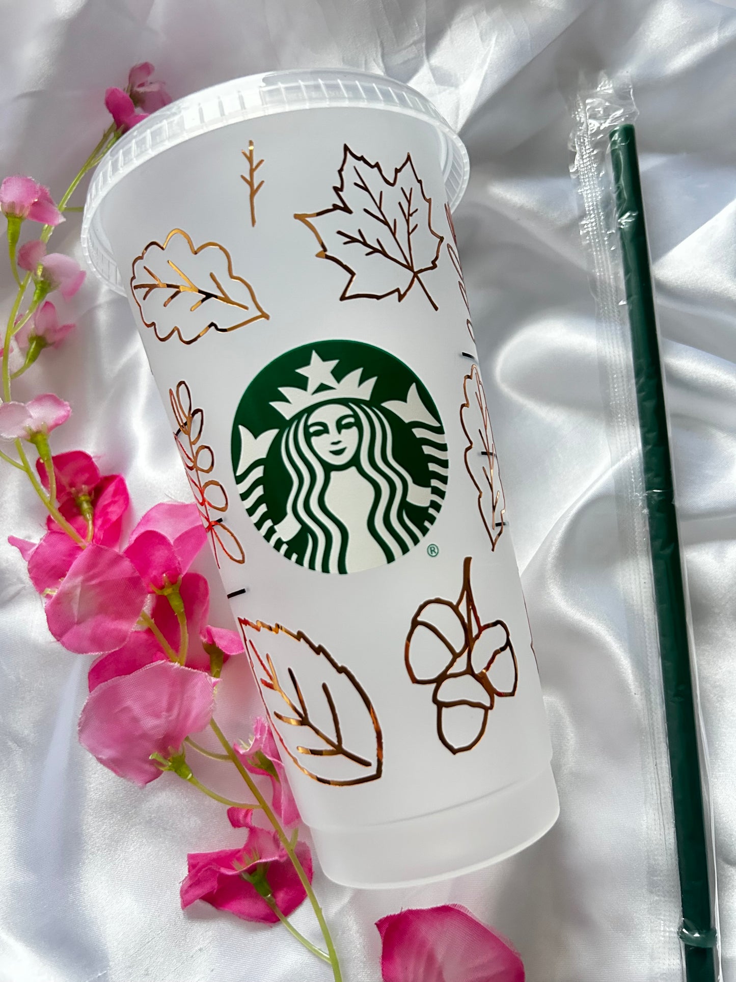 Shiny gold autumn leaf logo cold cup